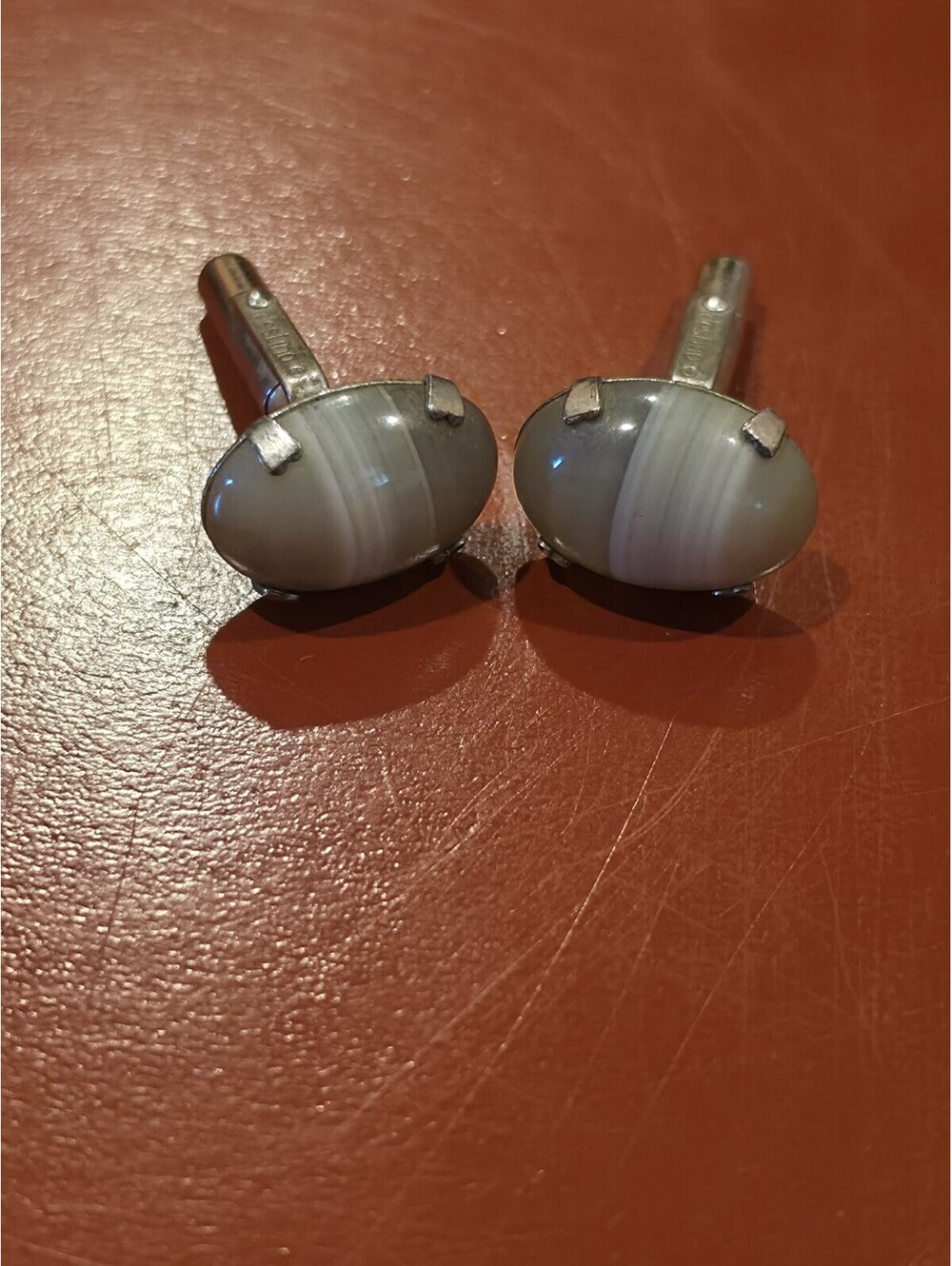 vintage Destino brand cufflinks featuring oval, gray banded agate gemstones...